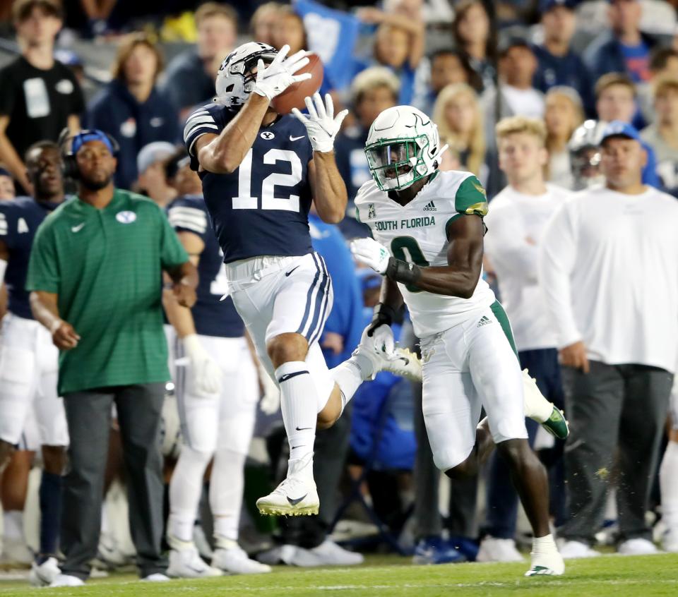 BYU wide receiver Puka Nacua hauls in a long pass during game against South Florida at LaVell Edwards Stadium in Provo. Nacua and the Cougars open the 2022 season against South Florida in Tampa.