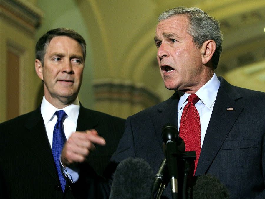 WASHINGTON – SEPTEMBER 28: U.S. President George W. Bush (R) speaks to the media as U.S. Senate Majority Leader Sen. Bill Frist (R-TN) (L) looks on after a meeting with Senate Republicans on Capitol Hill September 28, 2006 in Washington, DC. (Photo by Alex Wong/Getty Images)