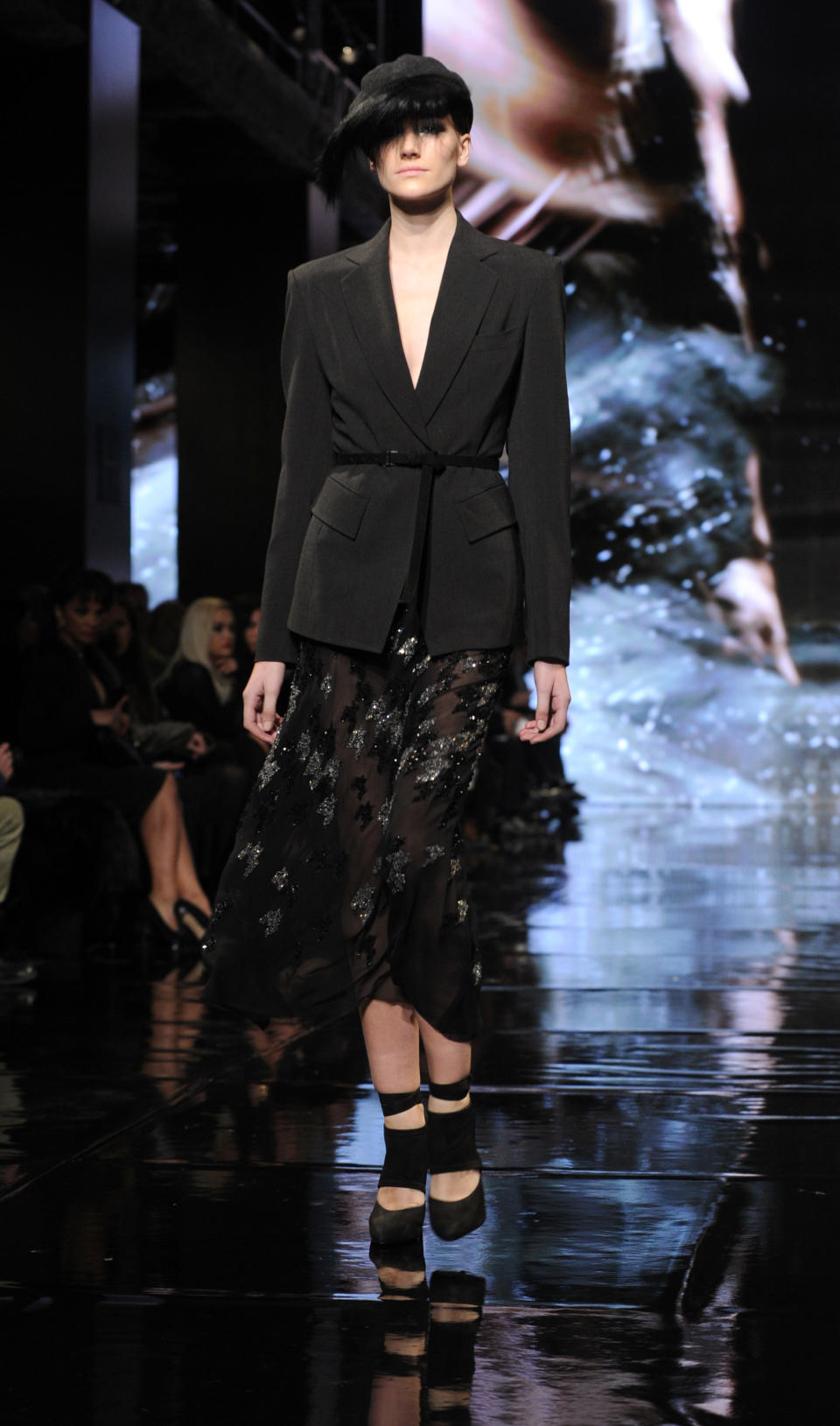 The Donna Karan New York Fall 2014 collection is modeled during Fashion Week, Monday, Feb. 10, 2014, at 23 Wall Street in New York. (AP Photo/Diane Bondareff)