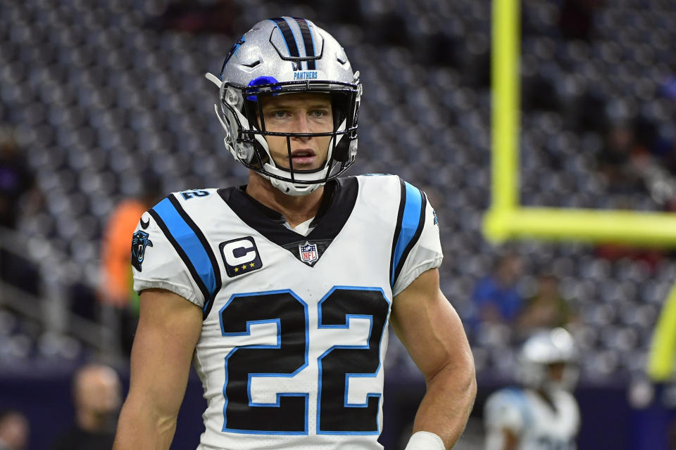 FILE - In this Thursday, Sept. 23, 2021, file photo, Carolina Panthers running back Christian McCaffrey (22) warms up before an NFL football game against the Houston Texans in Houston. McCaffrey did not practice Thursday, Oct. 14, 2021, a sign that he could miss his third straight game while trying to rehab from a hamstring injury. (AP Photo/Justin Rex, File)