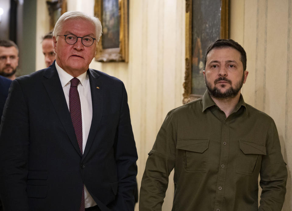 German President Frank-Walter Steinmeier, left, and Ukrainian President Volodymyr Zelenskyy walk during their meeting in Kyiv, Ukraine, Tuesday, Oct. 25, 2022.(Ukrainian Presidential Press Office via AP)