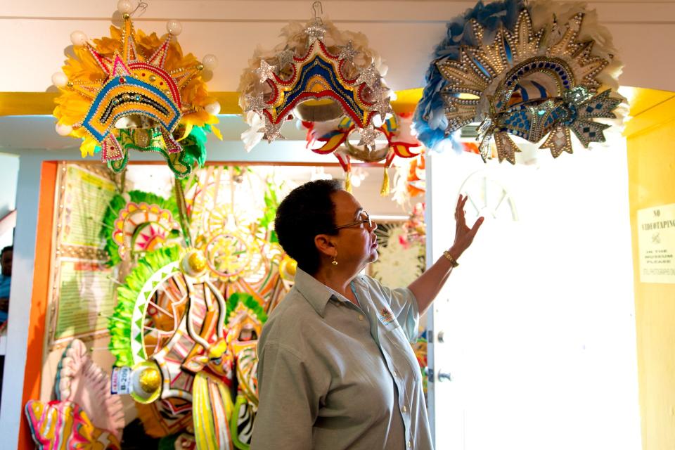 Arlene Nash Ferguson showcases Junkanoo headpieces at the Educulture Junkanoo Museum in The Bahamas.