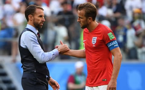 England's coach Gareth Southgate (L) shakes hands with England's forward Harry Kane after losing their Russia 2018 World Cup play-off for third place football match between Belgium and England - Credit: AFP