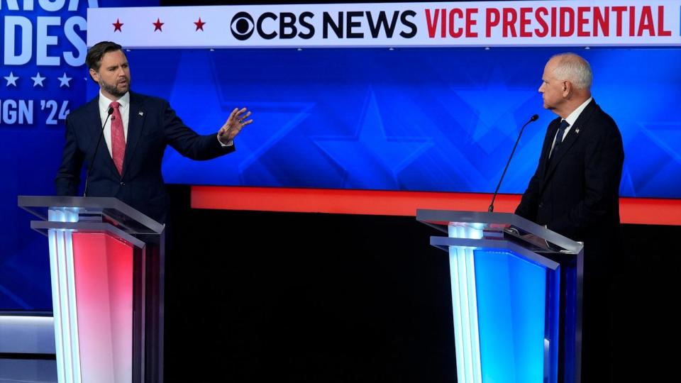 PHOTO: Republican vice presidential candidate Sen. JD Vance and Minnesota Governor and Democratic vice presidential candidate Tim Walz participate in the Vice Presidential debate in New York City, October 1, 2024. (Matt Rourke/AP)