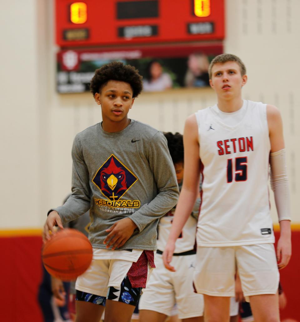 Seton sophomore Braiden Hogg dribbles the ball during warmups before a game against Blue River Valley Jan. 25, 2022.