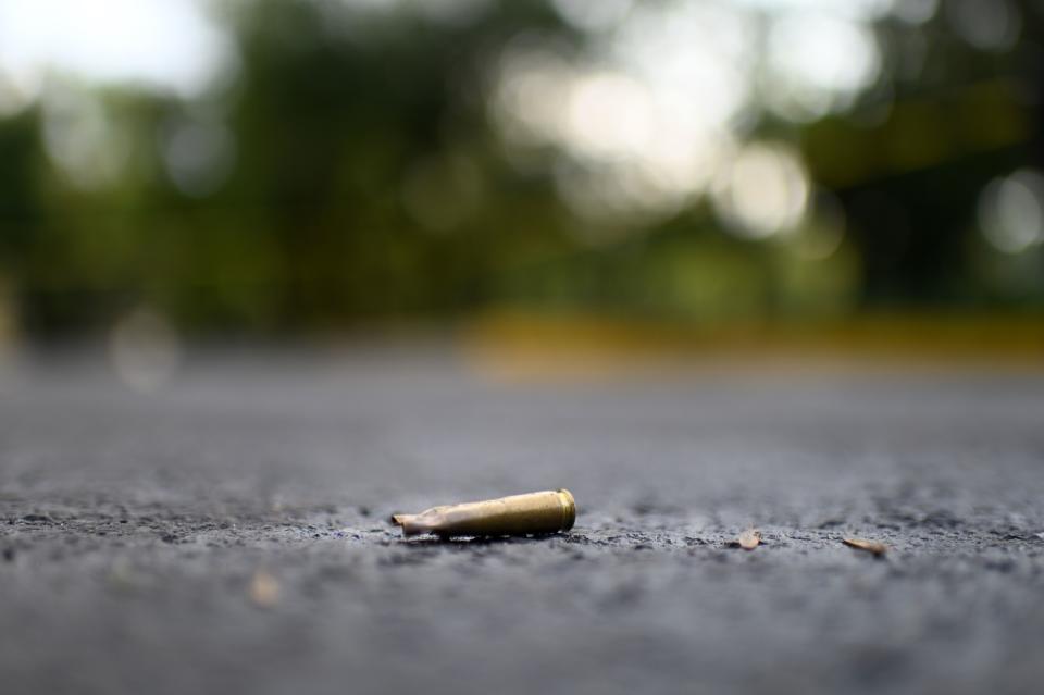 A bullet casket is seen on the ground at the crime scene after Mexico City's Public Security Secretary Omar Garcia Harfuch was wounded in an attacked in Mexico City, on June 26, 2020. (Photo by PEDRO PARDO / AFP) (Photo by PEDRO PARDO/AFP via Getty Images)