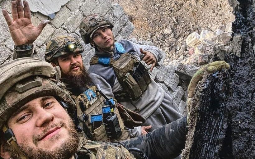 This undated handout picture released by the Ukrainian President Administration press-service shows Ukrainian fighters at the Azovstal steelworks of Ukrainian city of Mariupol. (Photo by Ukrainian President Administration press-service / AFP) / RESTRICTED TO EDITORIAL USE - MANDATORY CREDIT 