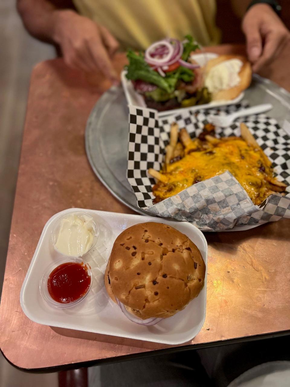 Original Hamburger Works in Phoenix serves mesquite grilled burgers by weight.