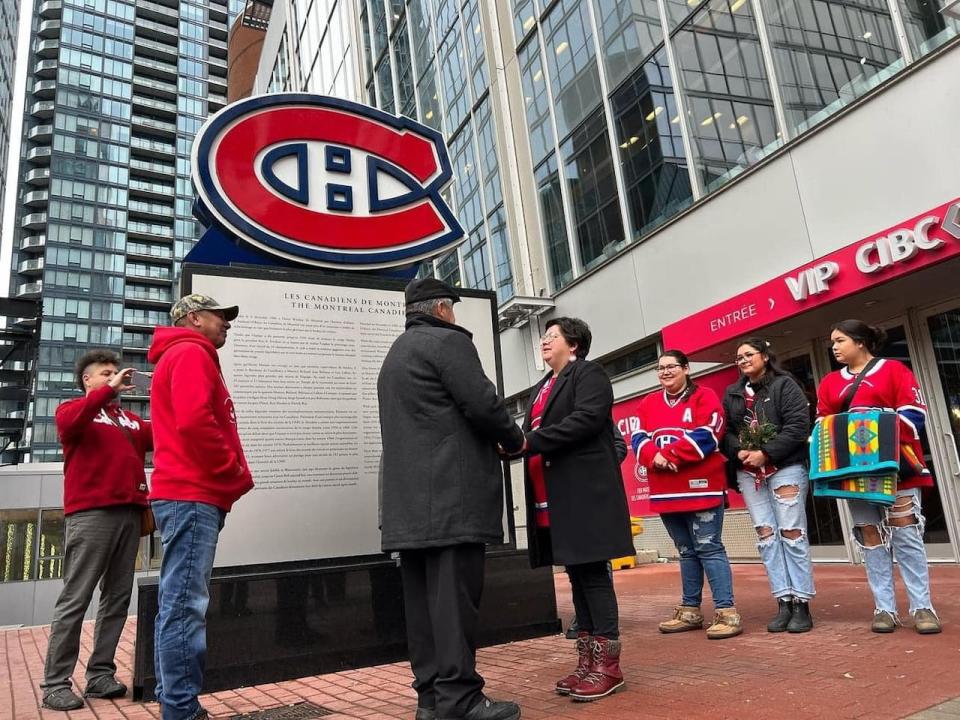 The Cheechoo's exchange their "I do's" on the side walk Bell Centre, where their favorite hockey team, the Montreal Canadians play. 