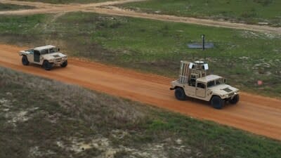 The Advanced Multilayered Mobile Force Protection (AM2FP) system, mounted on the leading high-mobility multipurpose wheeled vehicle (HMMWV) can autonomously protect the convoy’s high value assets (HVA) from small Unmanned Aircraft Systems (sUAS) threats – whether on the move or when stopped. (Photo: Leidos)