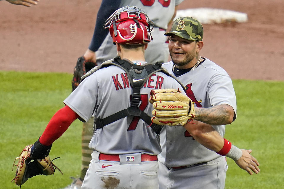 St. Louis Cardinals relief pitcher Yadier Molina, right, celebrates with catcher Andrew Knizner after getting the final out of a baseball game against the Pittsburgh Pirates in Pittsburgh, Sunday, May 22, 2022. (AP Photo/Gene J. Puskar)