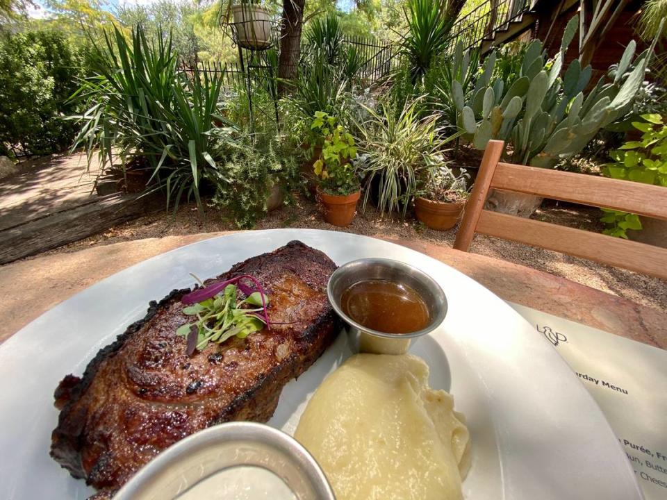 A prime rib lunch platter with whipped potatoes on the creekside patio at Lonesome Dove Western Bistro.