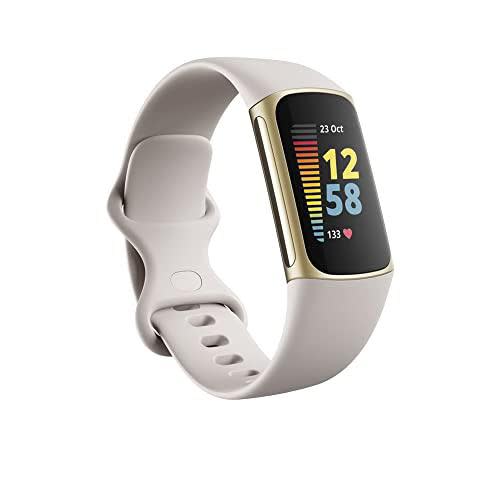 Fitbit Charge 5 Rastreador avanzado de actividad física y salud con GPS incorporado, herramientas de control del estrés, seguimiento del sueño, frecuencia cardíaca 24/7 y más, blanco lunar/oro suave, talla única (correas S&L incluidas)