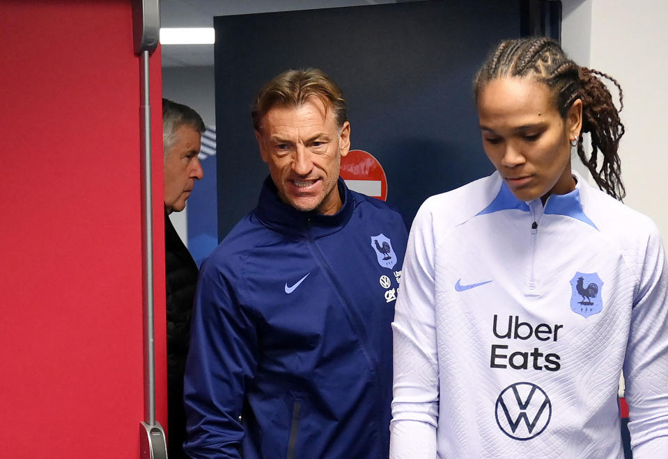 France’s Women’s national football team head coach Hervé Renard and the team’s defender <a class="link " href="https://sports.yahoo.com/soccer/players/3906993" data-i13n="sec:content-canvas;subsec:anchor_text;elm:context_link" data-ylk="slk:Wendie Renard;sec:content-canvas;subsec:anchor_text;elm:context_link;itc:0">Wendie Renard</a> arrive for a press conference at Stade Gabriel Montpied in Clermont-Ferrand, <a class="link " href="https://sports.yahoo.com/soccer/teams/france-women/" data-i13n="sec:content-canvas;subsec:anchor_text;elm:context_link" data-ylk="slk:France;sec:content-canvas;subsec:anchor_text;elm:context_link;itc:0">France</a>, on April 6, 2023.<span class="copyright">Franck Fife—AFP/Getty Images</span>