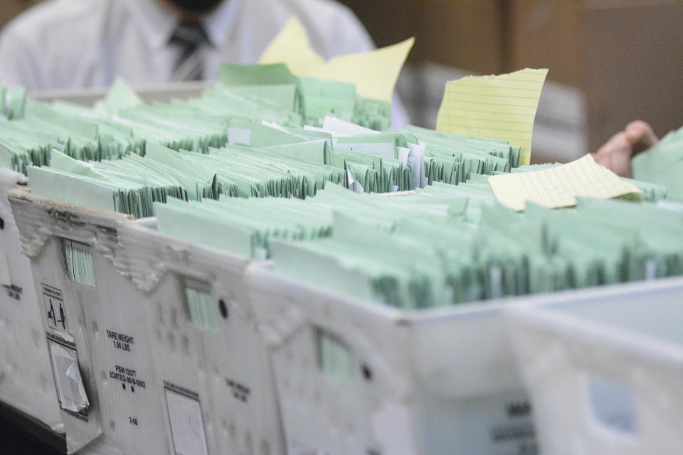 Uncounted provisional ballots sit in boxes at the Schuylkill County Election Bureau in Pottsville, Pa. on Tuesday, Nov. 10, 2020. (Lindsey Shuey/The Republican-Herald via AP)