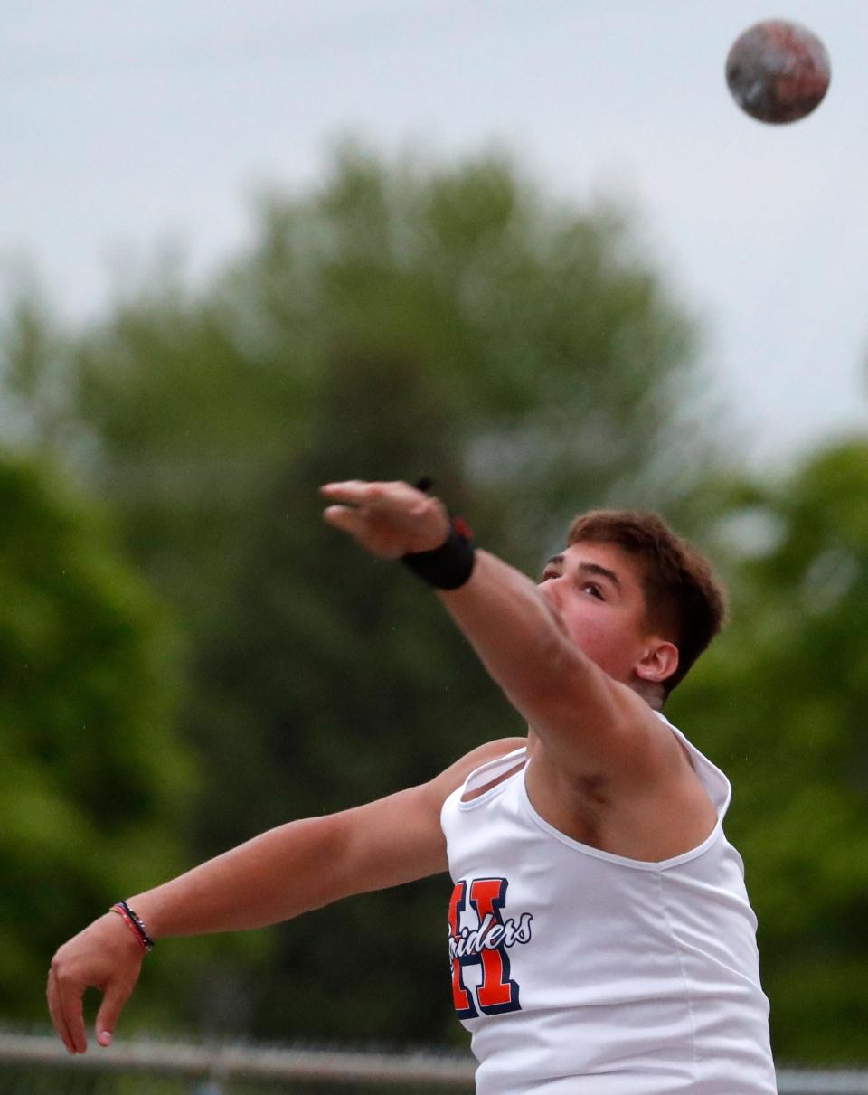 Harrison Nikolaus Papadogiannis competes in the shot put during the IHSAA boy’s track and field sectional meet, Thursday, May 16, 2024, at West Lafayette High School in West Lafayette, Ind.