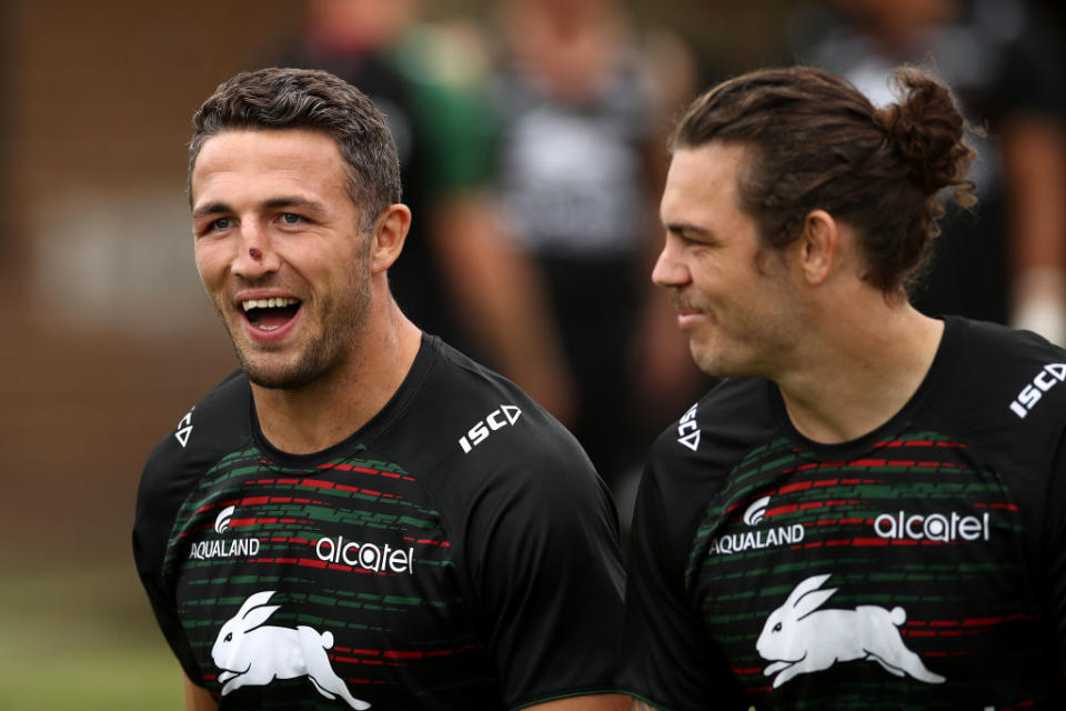 Sam Burgess of the Rabbitohs and Ethan Lowe of the Rabbitohs walk onto the field. (Photo by Cameron Spencer/Getty Images)