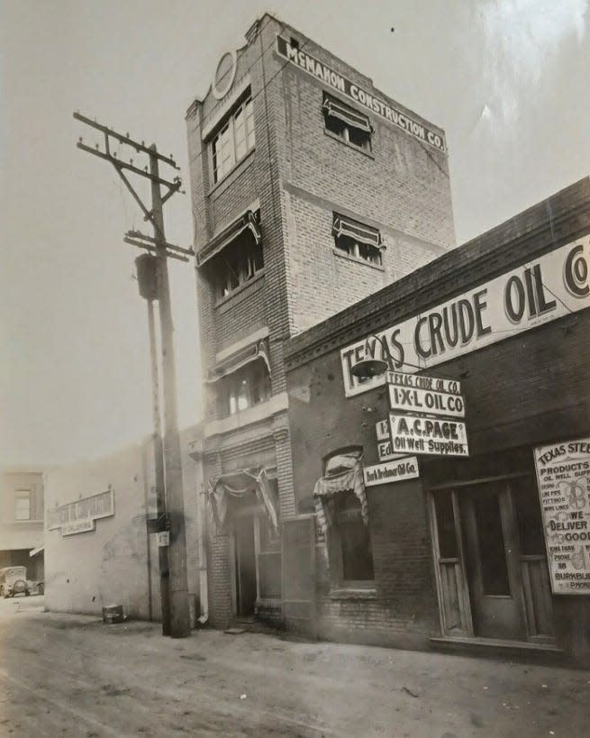 This photo of the Littlest Skyscraper from the 1920s shows the McMahon Construction Co. sign at the top. J.D. McMahon was accused of perpetrating a swindle in the construction of the building. The photo was taken from the defunct LaSalle Street and shows Seventh Street on the far left. The Texas Crude Oil Building no longer exists.