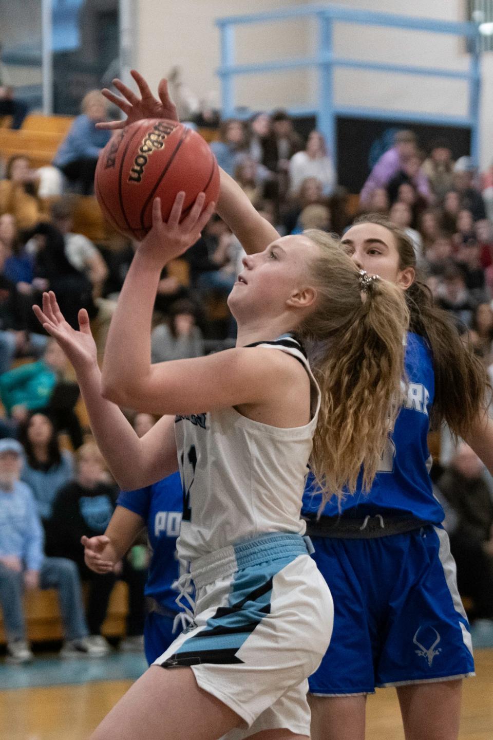 Pueblo West's Makenna McGraw goes in for a layup in the first round of the Class 5A state playoffs against Poudre at Jerry Kersey Gymnasium on Tuesday, Feb. 22, 2022.