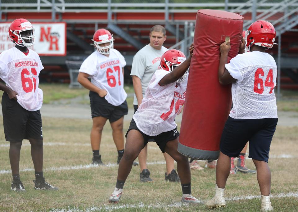 The North Rockland High School football team work out on the opening day of practice, Aug. 20, 2022, at their school in Thiells. 