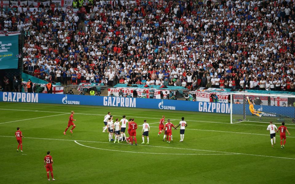 Mikkel Damsgaard of Denmark scores their side's first goal past Jordan Pickford of England during the UEFA Euro 2020 Championship Semi-final match between England and Denmark at Wembley - Why Denmark's free-kick goal was just as dodgy as England's penalty - GETTY IMAGES