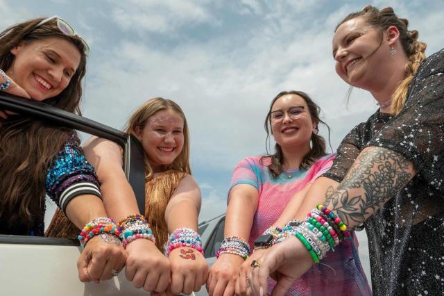 Photos: Taylor Swift fans wear their tributes to superstar's songs to  Arrowhead concert