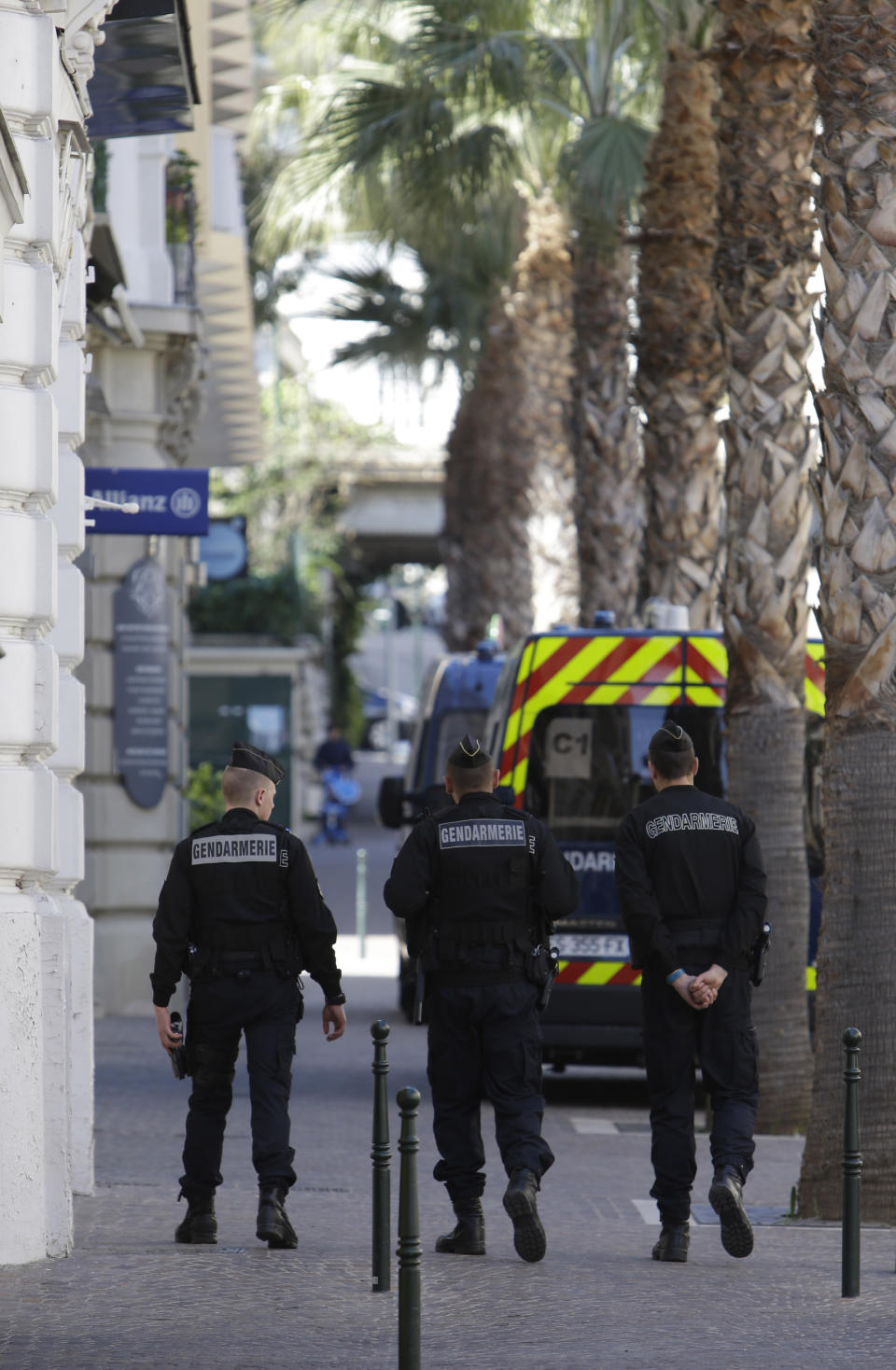 Police officers patrol in Beaulieu-sur-Mer, southern France, Sunday, March, 24, 2019, where French President Emmanuel Macron and Chinese President Chinese President Xi Jinping will meet. A police boat and police divers worked to secure the area before his arrival, and security cordons blocked several roads in Nice, where Xi will stay overnight. (AP Photo/Claude Paris)