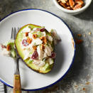 <p>Looking for a clean, packable lunch for work? This healthy homemade chicken salad served inside an avocado instead of with bread is just the ticket. Plus, this recipe makes enough for ready-made lunches for the week! If you have leftover cooked chicken on hand, skip Step 1 and use about 2 1/2 cups shredded chicken in Step 2. <a href="https://www.eatingwell.com/recipe/258092/chicken-salad-stuffed-avocados/" rel="nofollow noopener" target="_blank" data-ylk="slk:View Recipe;elm:context_link;itc:0;sec:content-canvas" class="link ">View Recipe</a></p>