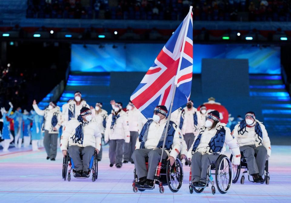 Wheelchair curlers Meggan Dawson-Farrell and Gregor Ewan carried the flag for the Great Britain Paralympic team during the athlete parade in Beijing (Joe Toth for OIS/PA) (PA Media)