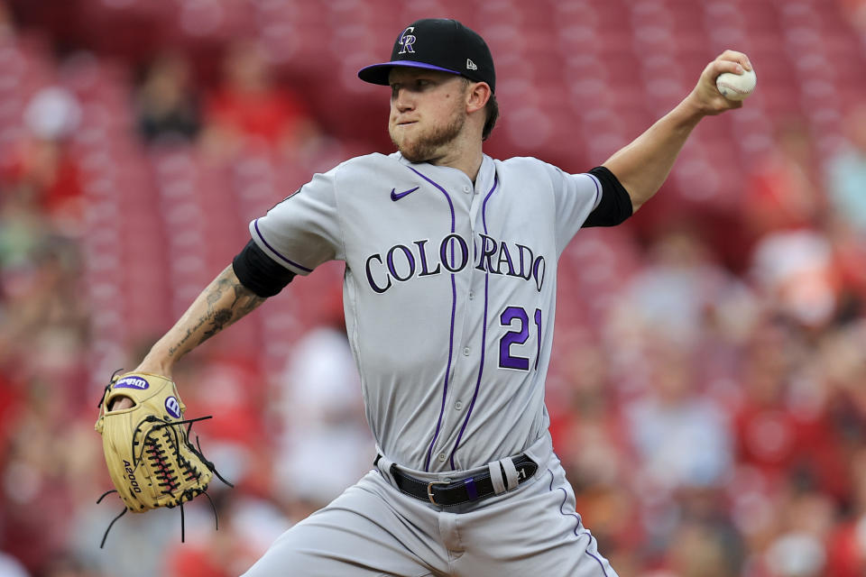 Colorado Rockies' Kyle Freeland throws during the second inning of the team's baseball game against the Cincinnati Reds in Cincinnati, Friday, June 11, 2021. (AP Photo/Aaron Doster)