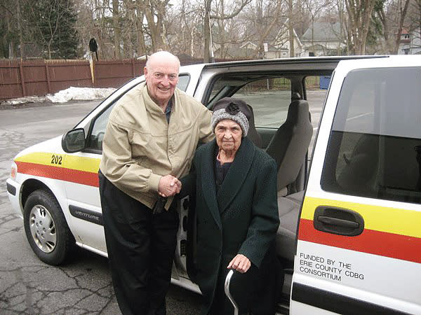 An unidentified passenger and driver with Rural Transit Service, an organization in New York's Erie County that provides transportation to older adults for health-related appointments. (Rural Transit Service)