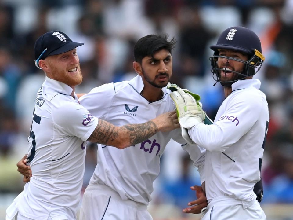 Shoaib Bashir of England celebrates with captain Ben Stokes and Ben Foakes after taking Rajat Patidar’s wicket in Ranchi  (Getty)