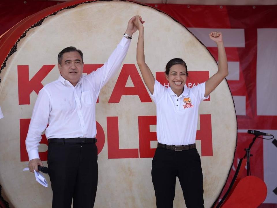 DAP secretary-general Anthony Loke announcing Seri Delima assemblyman Syerleena Abdul Rashid as candidate for Bukit Bendera. — Picture by Steven K.E.Ooi
