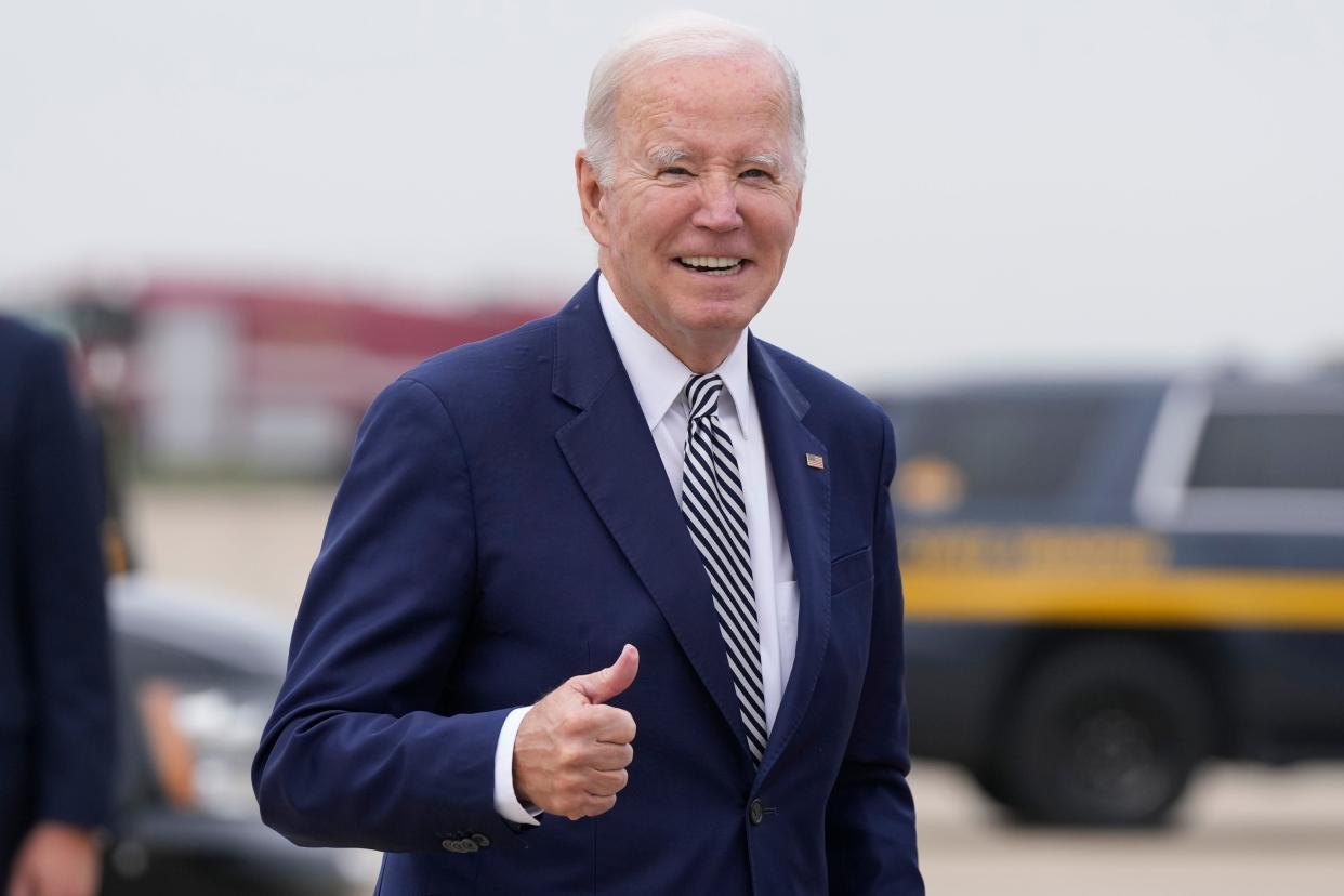 President Joe Biden gestures as he walks to board Air Force One at Delaware Air National Guard Base in New Castle, Del., Monday, Oct. 30, 2023.