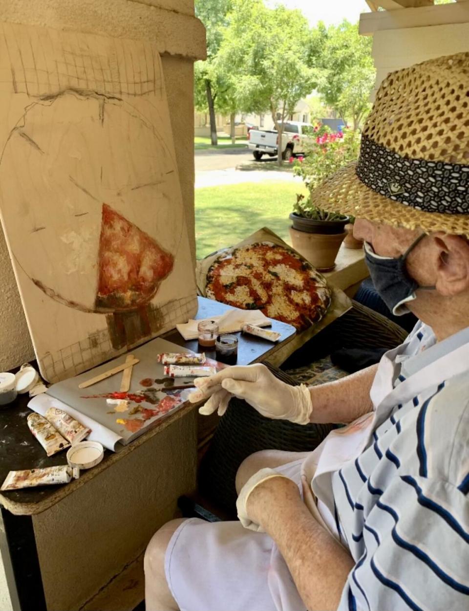 Leonard Bianco worked on a painting of a pizza that son Chris Bianco cooked for him