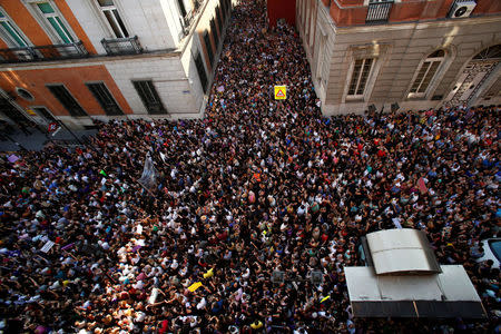 Protesters attend a demonstration against the release on bail of five men known as the "Wolf Pack" cleared of gang rape of a teenager and convicted of a lesser crime of sexual abuse in Madrid, Spain, June 22, 2018. REUTERS/Javier Barbancho