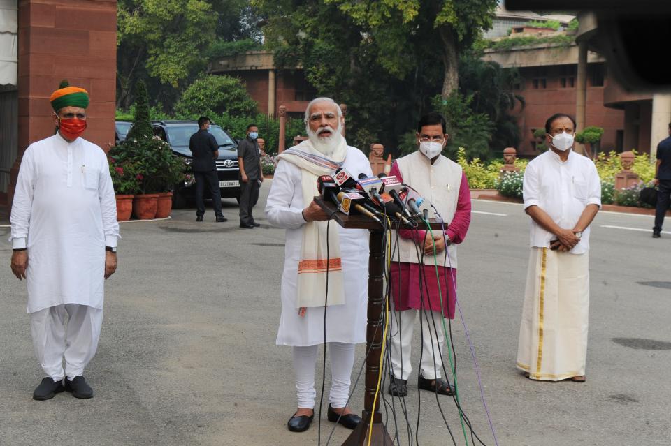 Indian Prime Minister Narendra Modi addresses the media as he arrives at the Parliament in New Delhi, India, Monday, Sept.14, 2020. Indian lawmakers have returned to Parliament after more than five months even as coronavirus cases continue to surge at the fastest pace than anywhere else in the world. (AP Photo)