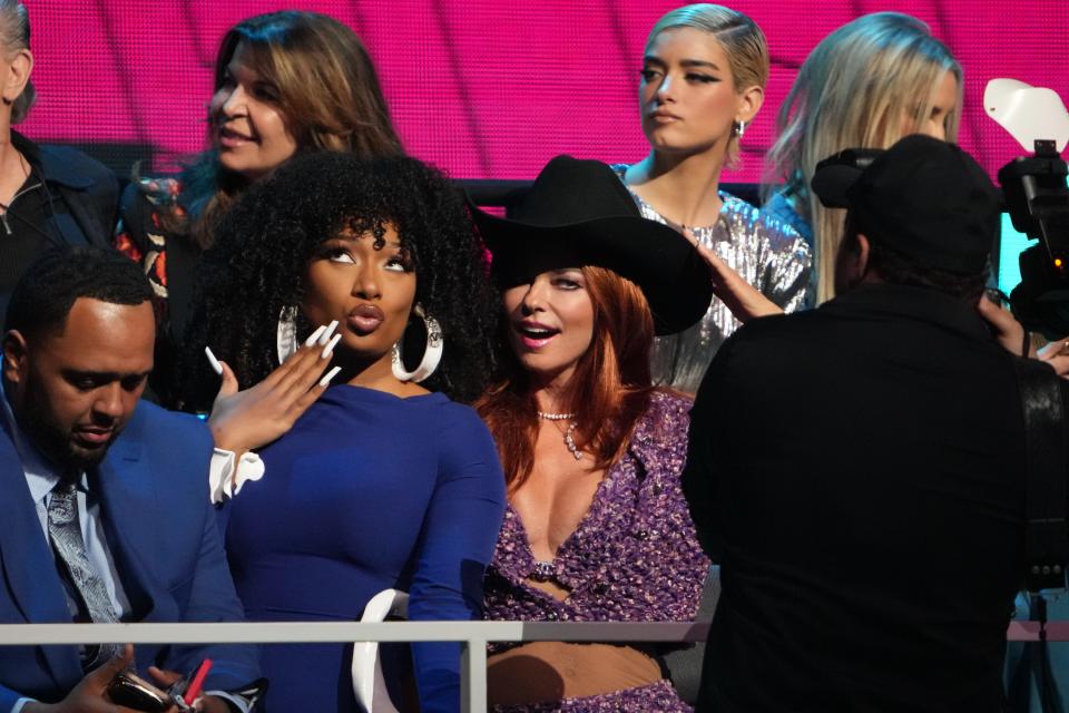 Megan Thee Stallion and Shania Twain sit together at the CMT Music Awards at the Moody Center on Sunday April 2, 2023.