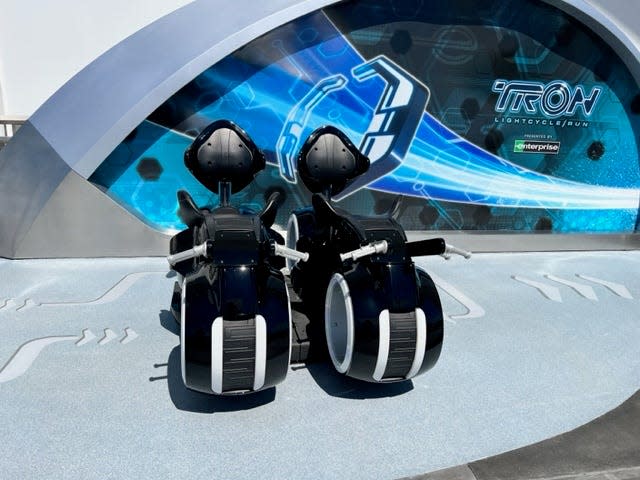 Guests can test out TRON Lightcycle / Run vehicles along that attraction's queue.