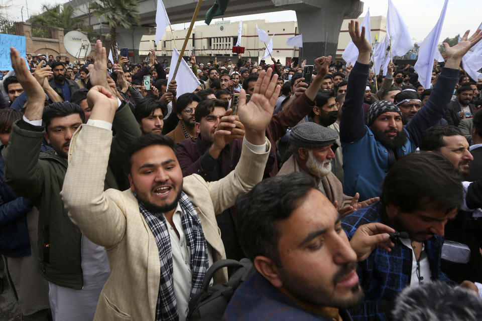 Supporters of Pakistan Tehreek-e-Insaf party take part in a rally denouncing militant attacks and demanding peace in the country, in Peshawar, Pakistan, Friday, Feb. 3, 2023. (AP Photo/Muhammad Sajjad)