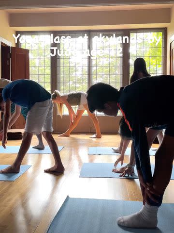 <p>Martha Stewart/Instagram</p> A yoga class in session, posted by Martha Stewart.