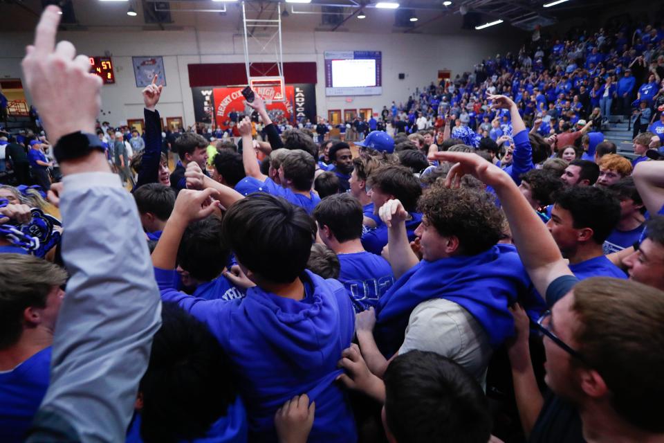 Spencer County celebrates beating Simon Kenton in the KHSAA 8th Region Championship.