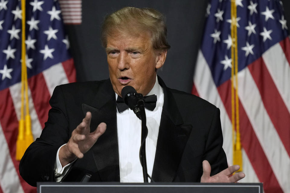 FILE - Former President Donald Trump speaks at Mar-a-Lago Friday, Nov. 18, 2022 in Palm Beach, Fla. The House panel investigating the Jan. 6 attack on the U.S. Capitol is considering recommending the Justice Department pursue three criminal charges against Trump, including insurrection. (AP Photo/Rebecca Blackwell, File)