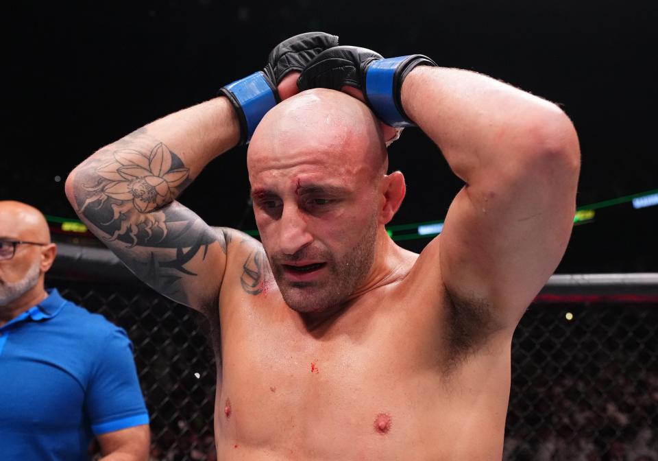 ABU DHABI, UNITED ARAB EMIRATES - OCTOBER 21: Alexander Volkanovski of Australia reacts after his TKO loss against Islam Makhachev of Russia in the UFC lightweight championship fight during the UFC 294 event at Etihad Arena on October 21, 2023 in Abu Dhabi, United Arab Emirates. (Photo by Chris Unger/Zuffa LLC via Getty Images)