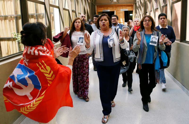 Demonstrators opposing the government shout slogans after the lawmakers rejected a move to impeach President Sebastian Pinera during a session at the congress in Valparaiso