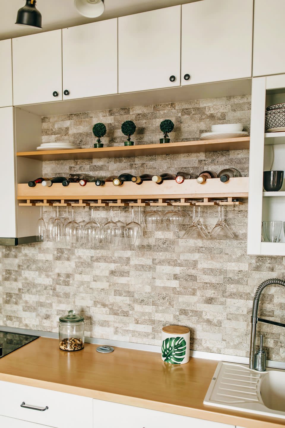 a kitchen with white cabinets