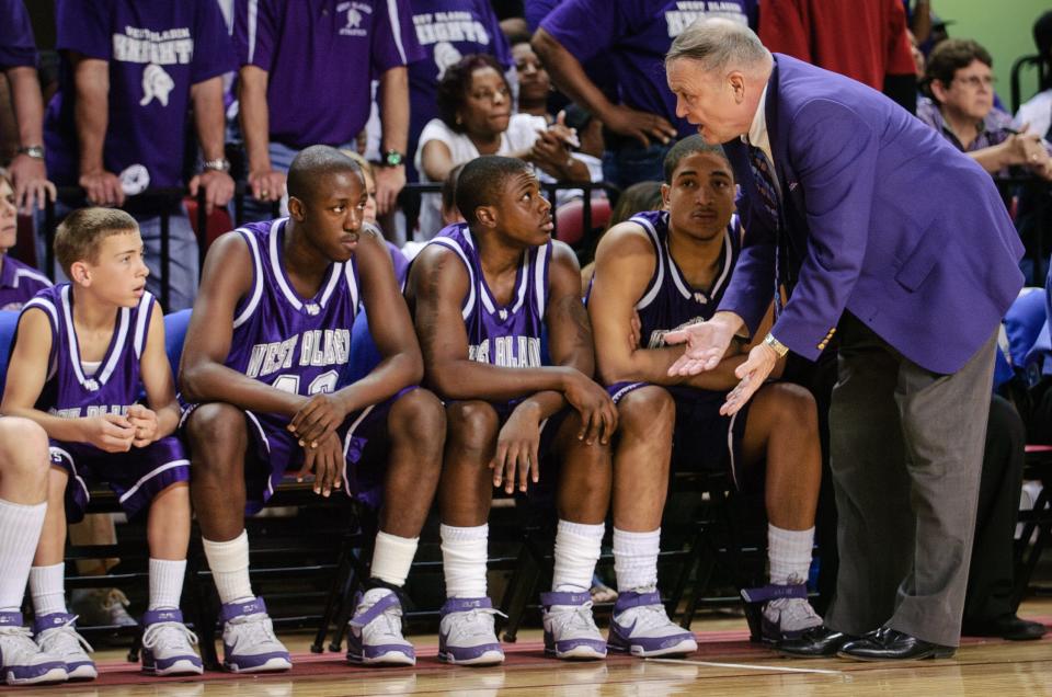 West Bladen coach Ken Cross talks to his players on the bench during the 2A boys basketball championship game against Pisgah High School at North Carolina State University on March 15, 2008.
