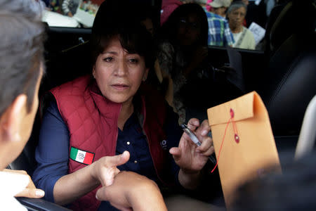 Delfina Gomez of the National Regeneration Movement (MORENA), candidate for the governor of the State of Mexico, greets supporters during her electoral campaign in Metepec, State of Mexico, Mexico May 16, 2017. Picture taken on May 16, 2017. REUTERS/Carlos Jasso