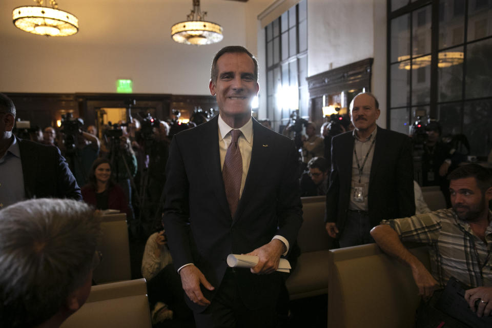 Los Angeles Mayor Eric Garcetti leaves a conference room after a news conference Tuesday, Jan. 29, 2019, in Los Angeles. Garcetti will not seek the Democratic presidential nomination in 2020, slightly winnowing a field that is still likely to be large and unwieldy for a party desperate to oust President Donald Trump.(AP Photo/Jae C. Hong)