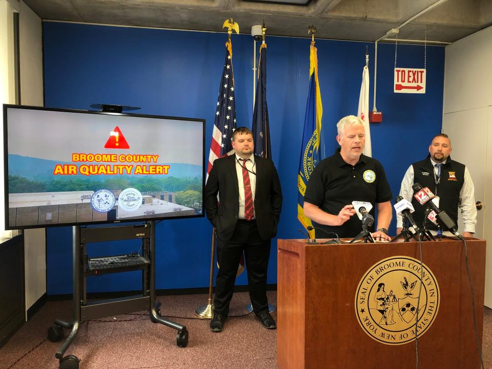 Broome County executive Jason Garnar, center, joined county director of environmental health Josh Phelps, left, and county director of the office of emergency services Patrick Dewing, right, inside the Broome County Office Building Wednesday, June 7, 2023 to update the public on the air quality issues.